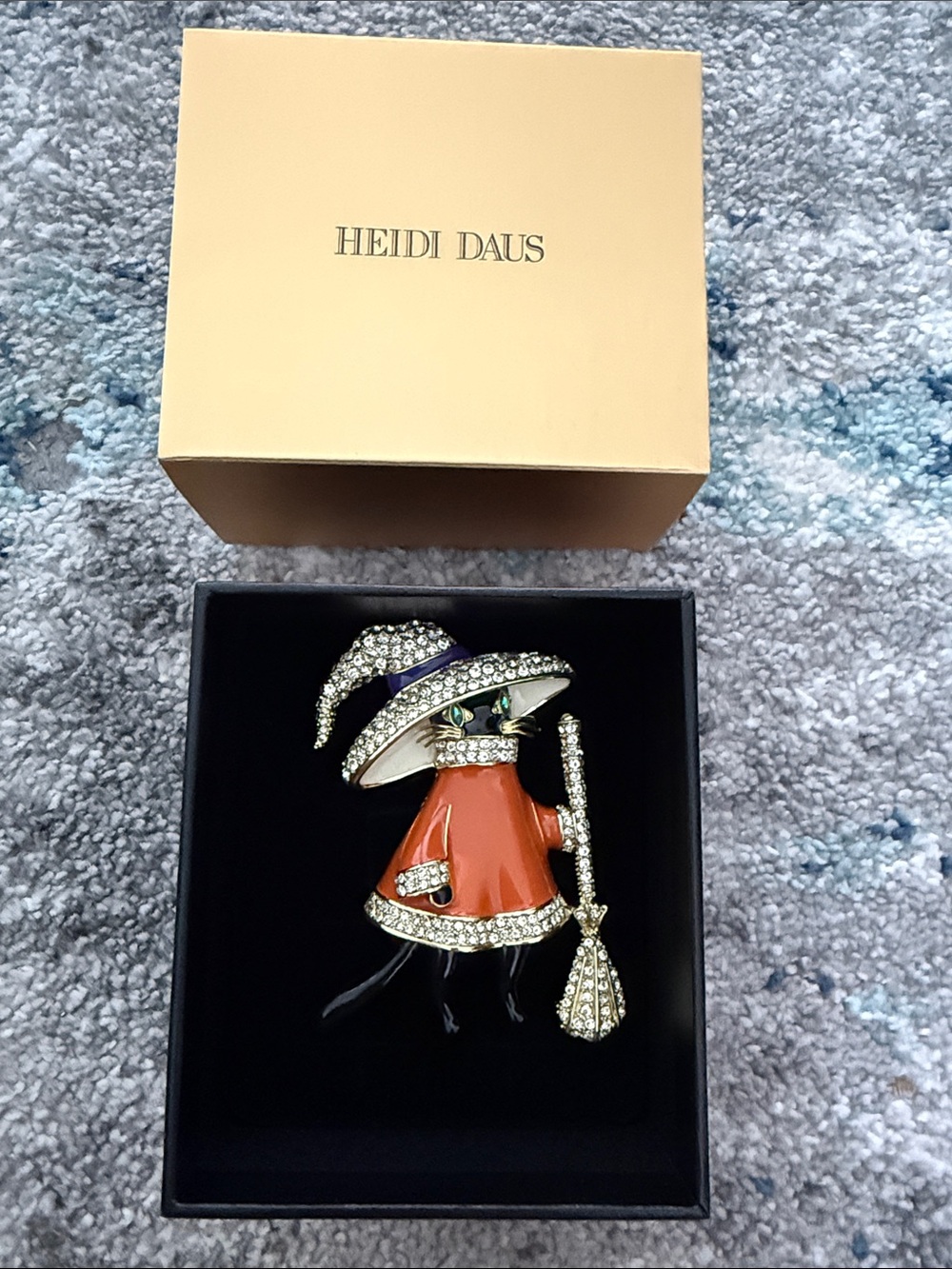Heidi Daus Orange Enamel Witch Brooch with Gold-Tone and Crystal Accents